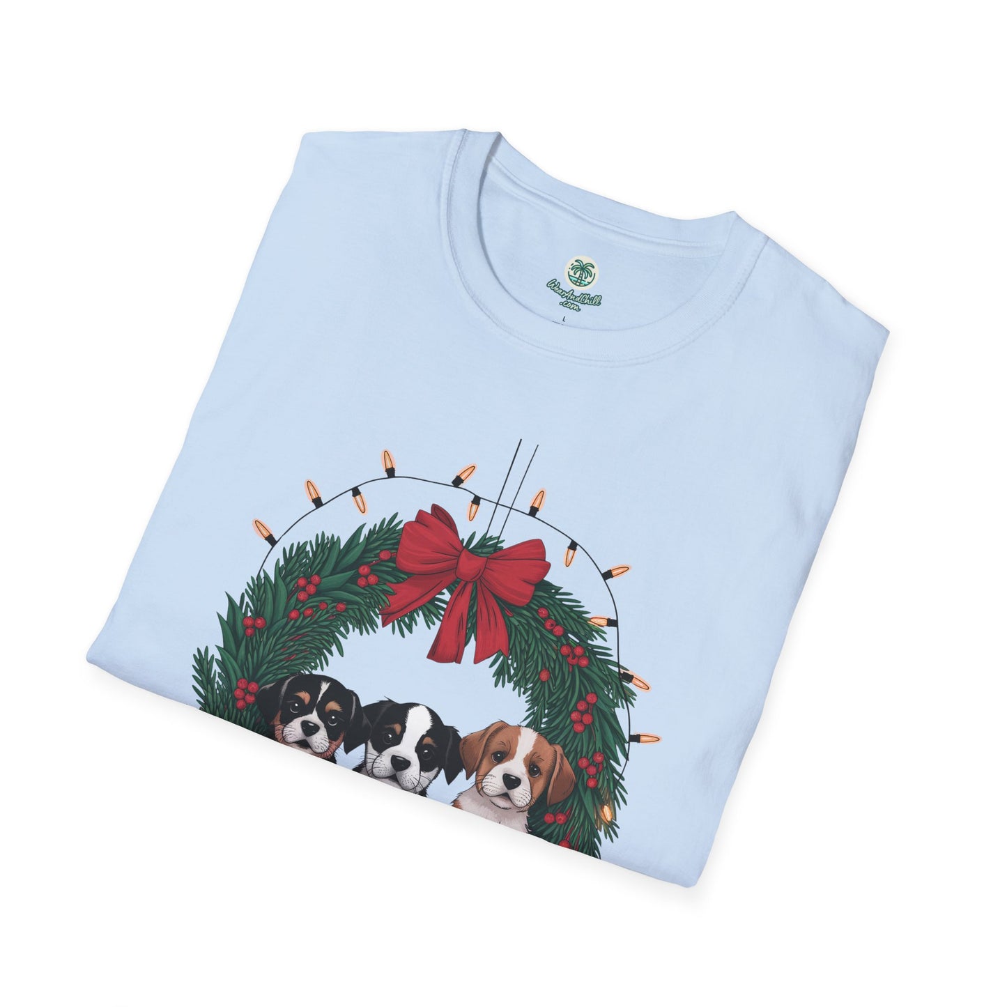 Puppies sitting in a Christmas wreath