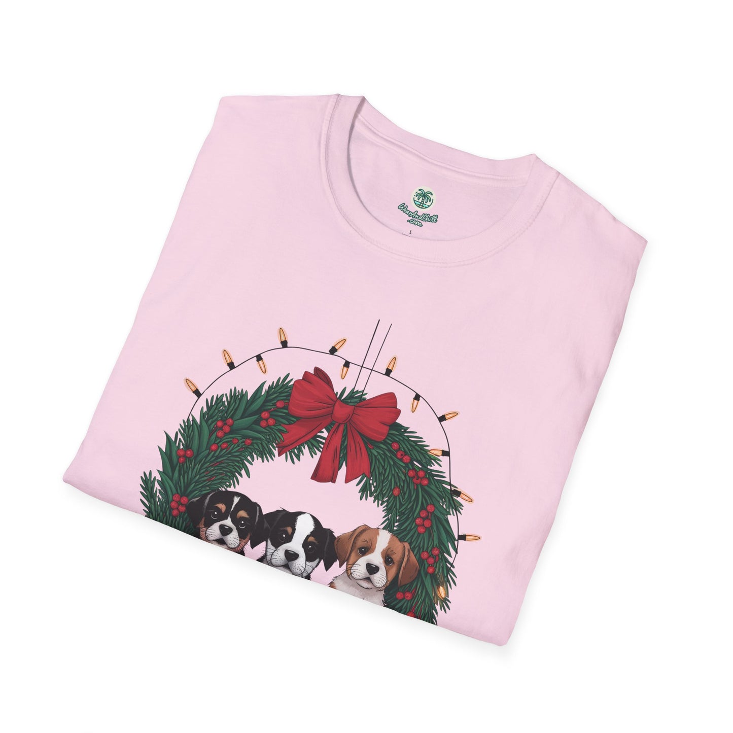 Puppies sitting in a Christmas wreath