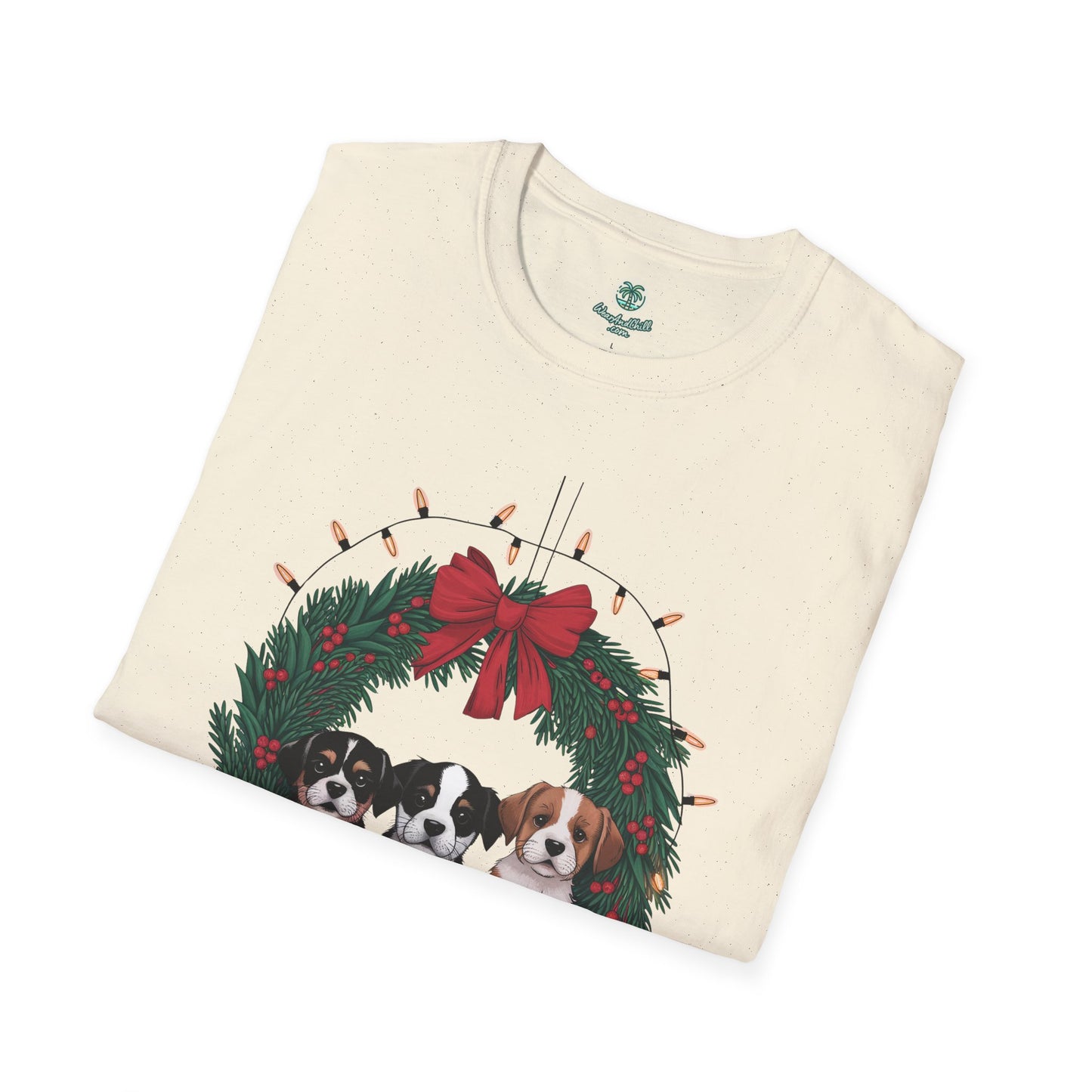 Puppies sitting in a Christmas wreath