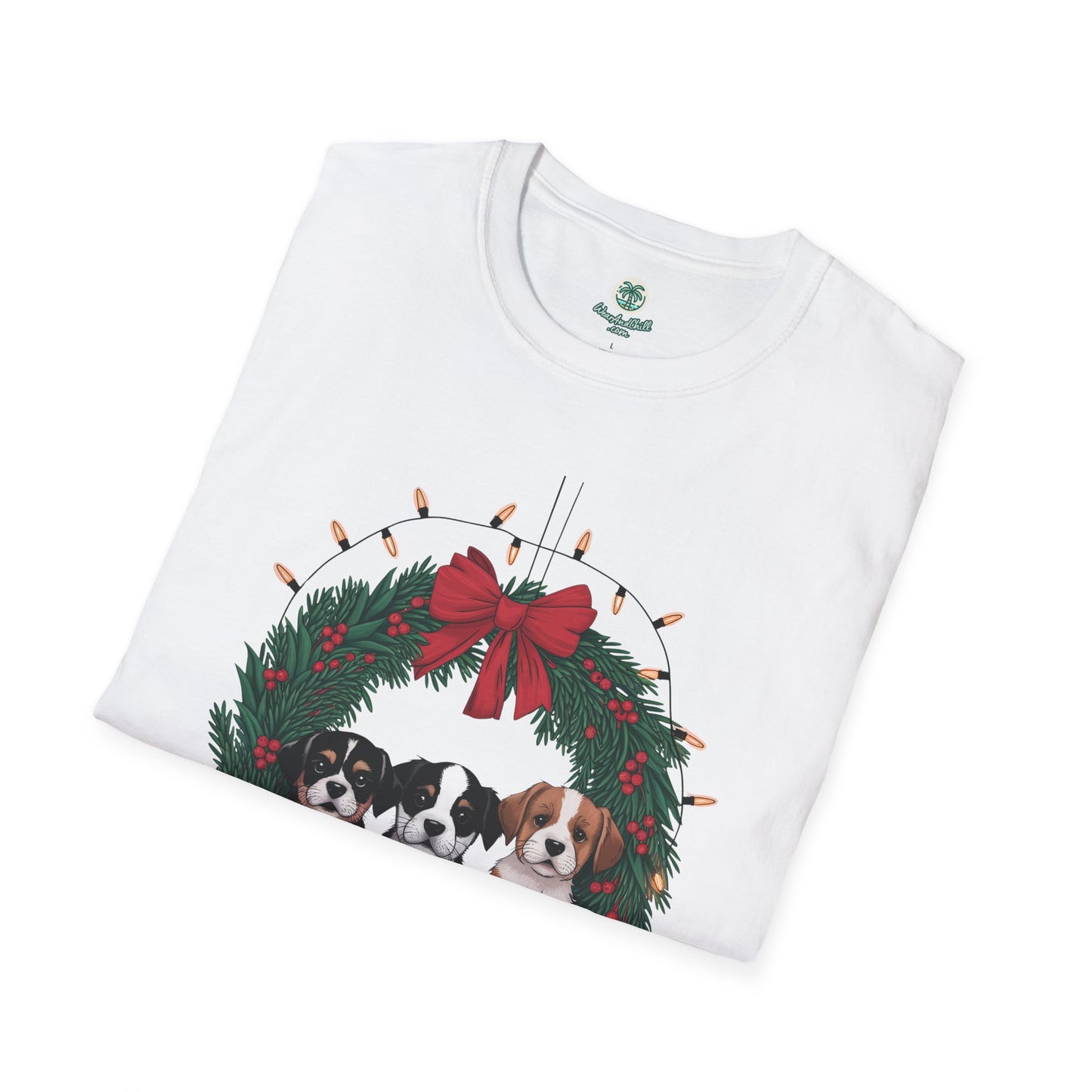 Puppies sitting in a Christmas wreath