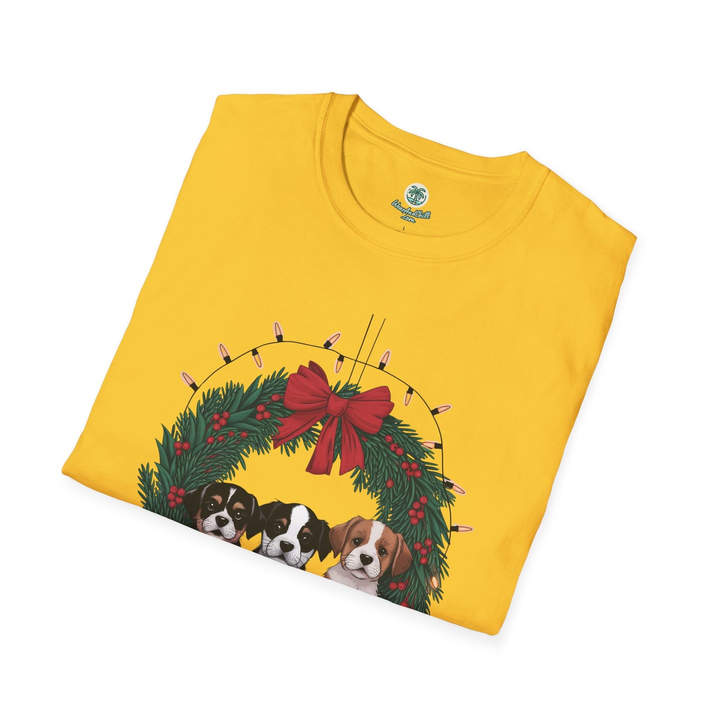 Puppies sitting in a Christmas wreath