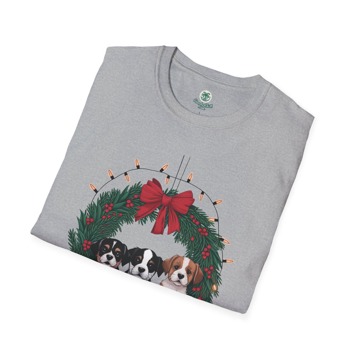Puppies sitting in a Christmas wreath