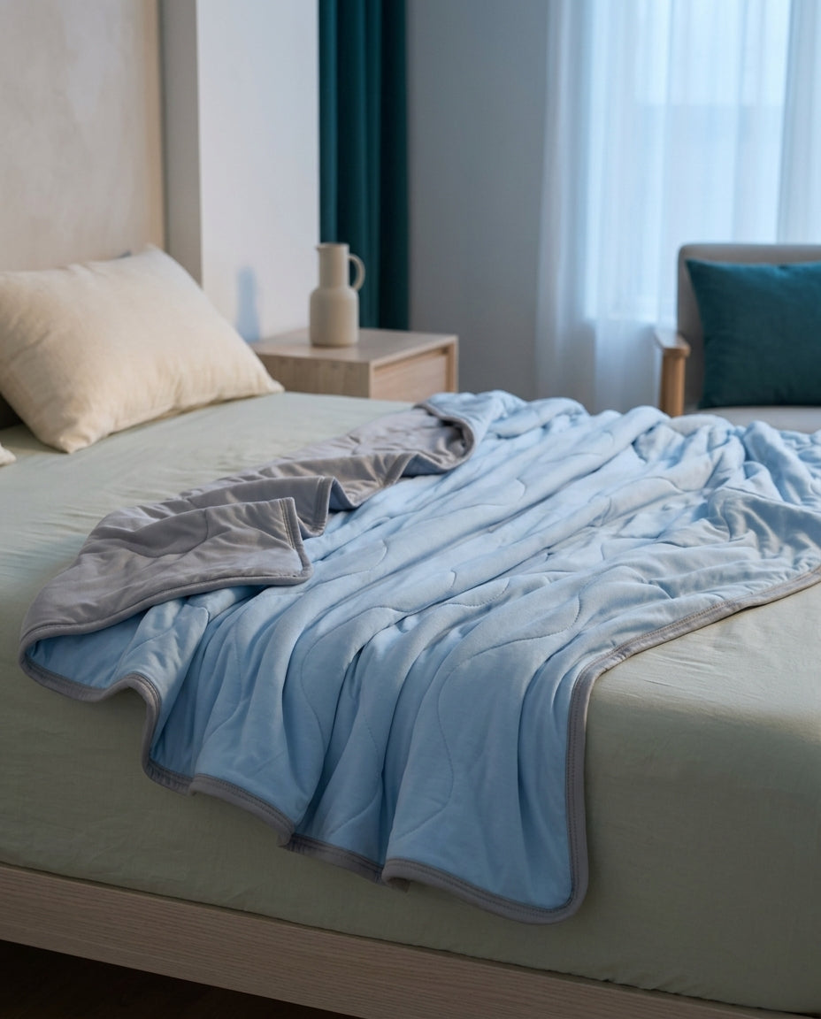 Wave-grid cool-touch summer quilt Still – drape