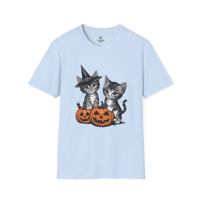 Gothic kittens playing with pumpkins